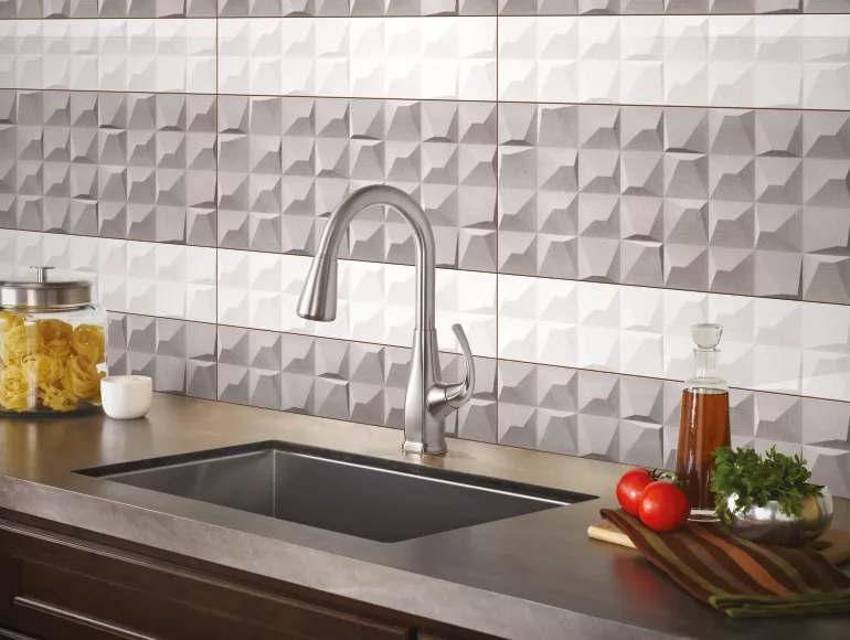 Luxurious small kitchen design using white & gyey tile with sink